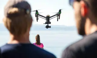 RCAA certified drone pilot operating DJI Inspire 3 cinema drone in Rwanda for aerial cinematography - GoodAV