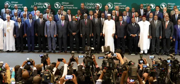 International heads of state and delegates at African summit plenary with broadcast staging and LED walls in Kigali - GoodAV
