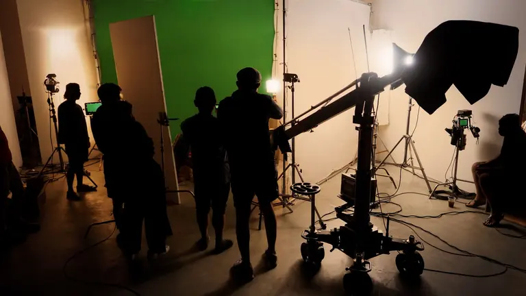 Film Crew Works Behind The Scenes On Set - Blog article illustration
